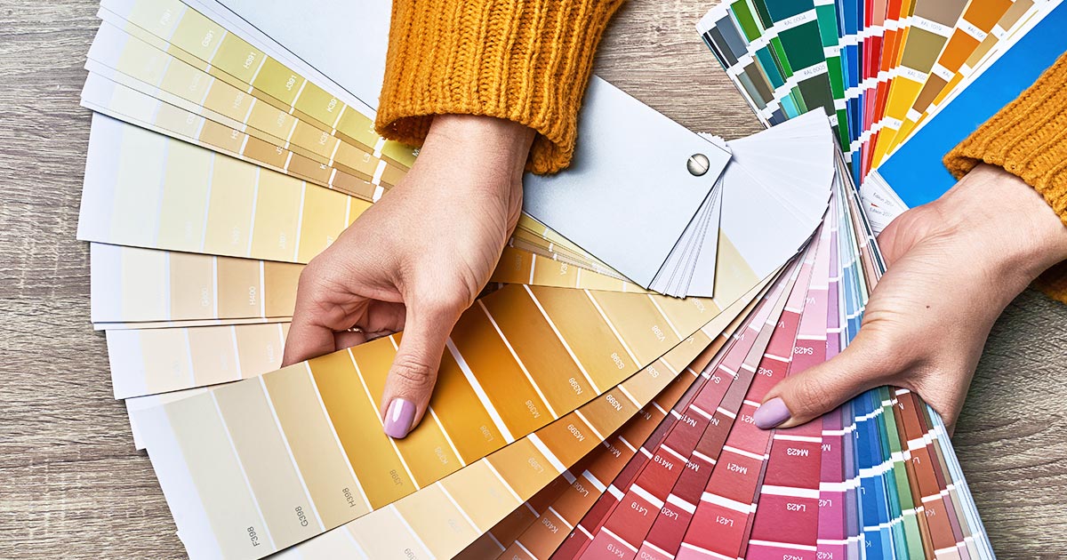 Interior Designer Working With Palette For Choosing Colors
