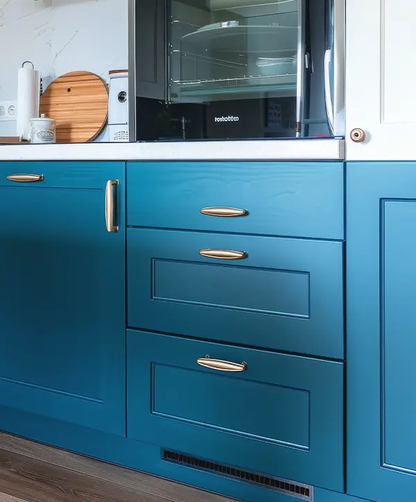 newly painted blue kitchen cabinet