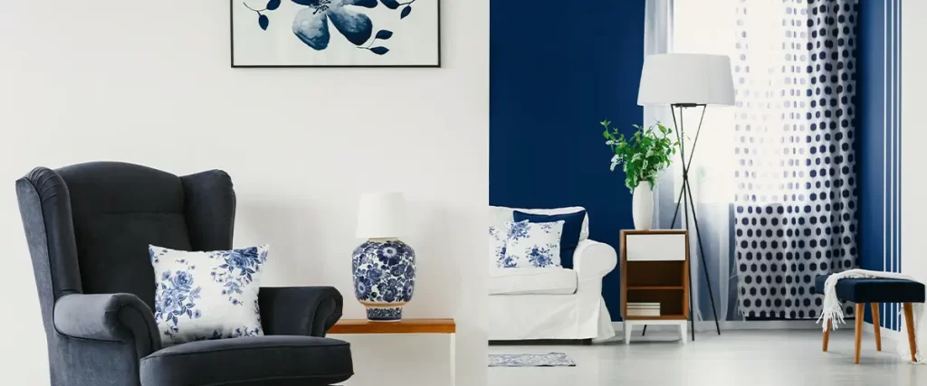 Modern living room with navy and white decor, featuring accent wall, stylish furniture, and elegant interior design.