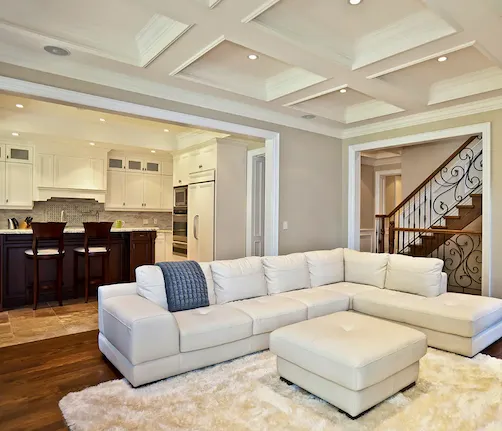 Clean living room painted in white color